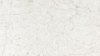 A close up of a white paper with a marble texture.