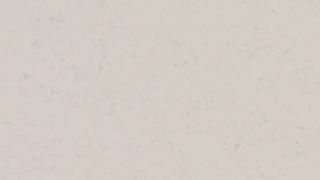 A close up of a white marble counter top.