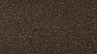 A close up of a brown carpet texture.