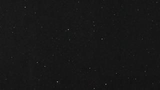 A black background with a lot of stars on it