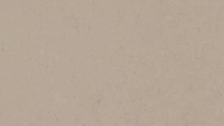 A close up of a beige paper texture.