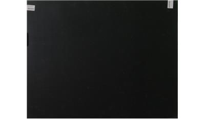 A black sheet of paper with a white sticker on it.