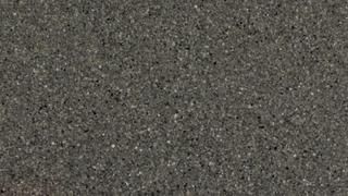 A close up of a gray granite counter top.