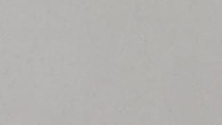 A close up of a white paper texture.