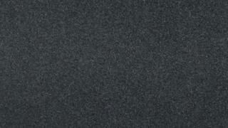 A close up of a black carpet texture.