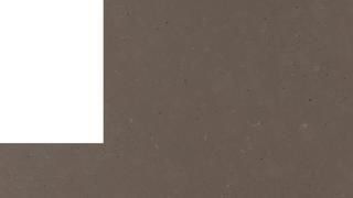 A close up of a piece of brown paper with a white border.