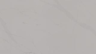 A close up of a gray tile with a marble texture.