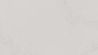 A close up of a white tile with a marble texture.