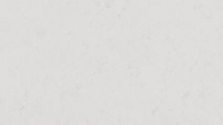 A close up of a white marble counter top.