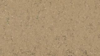 A close up of a brown granite counter top.