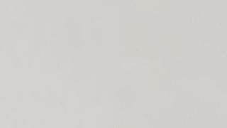 A close up of a white paper texture.