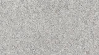 A close up of a gray carpet texture.