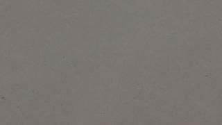 A close up of a gray fabric texture.