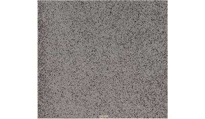 A close up of a gray tile on a white background.