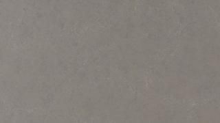 A close up of a piece of paper with a gray texture.
