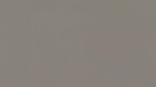 A close up of a plain gray background.