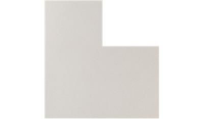 A white piece of paper is sitting on top of a white surface.