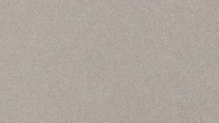 A close up of a piece of paper showing the texture of the paper.