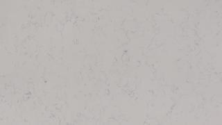 A close up of a white marble counter top.