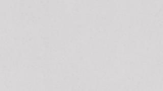 A close up of a white paper texture.