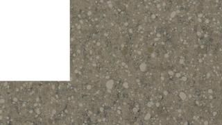 A close up of a gray granite counter top with a white border.