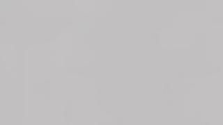 A close up of a plain gray background.