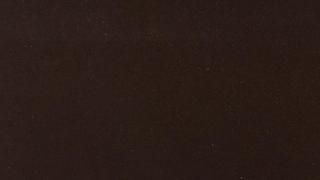 A close up of a brown leather texture.