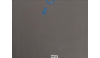A picture of a gray surface with blue dots on it