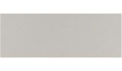 A close up of a gray tile on a white background.