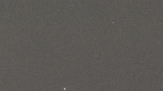 A close up of a piece of gray paper.