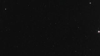 A black background with a lot of stars in it