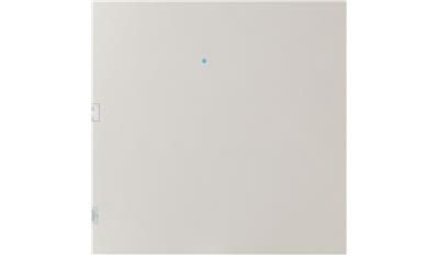 A white piece of paper with a hole in the middle on a white background.