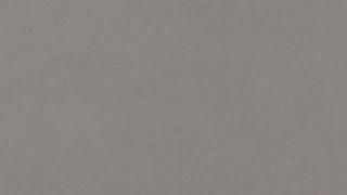 A close up of a gray fabric texture.