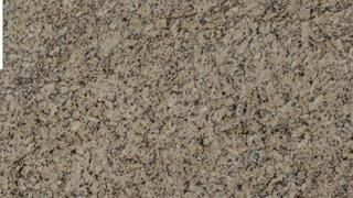 A close up of a piece of carpet with a grainy texture.