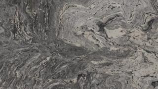 A close up of a marble counter top with a gray and white marble texture.
