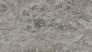 A close up of a gray granite counter top.