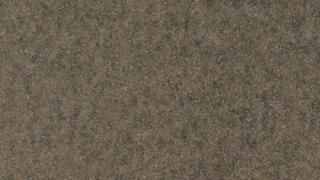 A close up of a brown carpet texture.