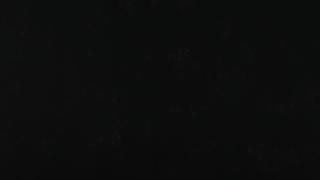 A black background with a few white lines on it