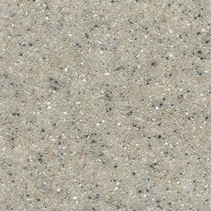 A close up of a gray granite counter top with black spots.