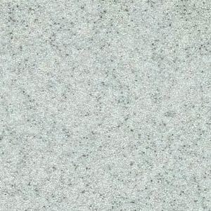 A close up of a white granite counter top.
