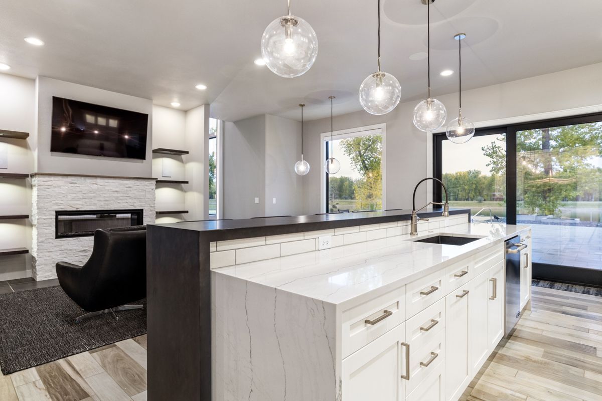 There is a large island in the middle of the kitchen.