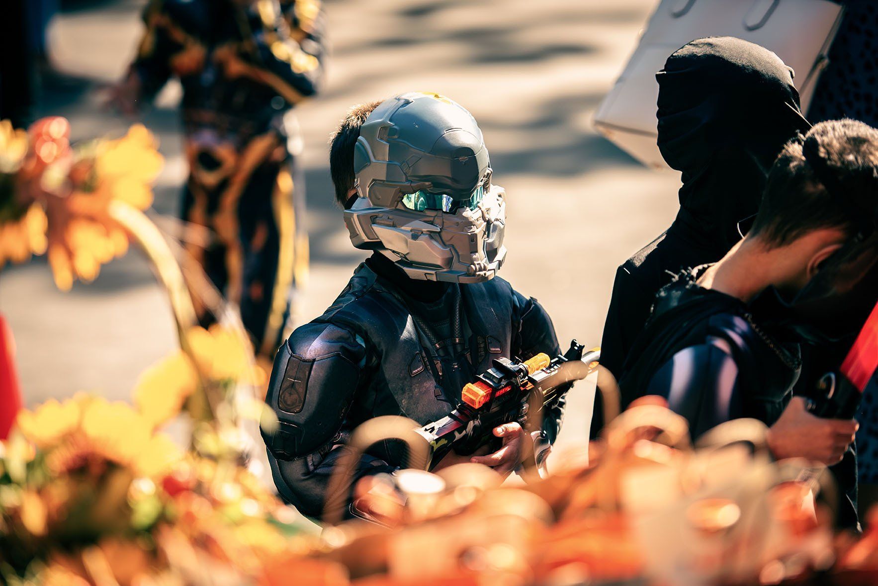 A person in a costume with a helmet on