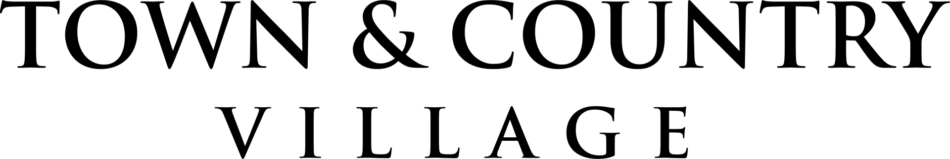 A black and white logo for town & country village