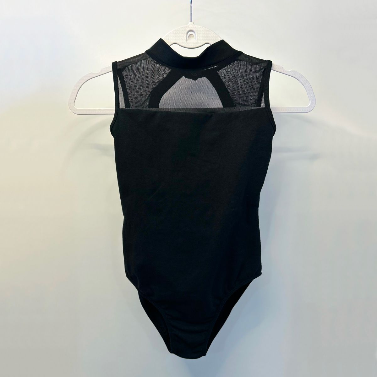 MAILLOT À COL HAUT SANS MANCHES