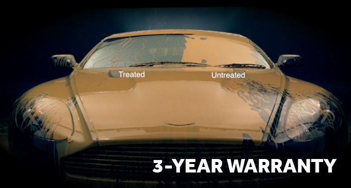 A car covered in mud shows a treated section where the mud rolls off, while the untreated section is still covered.