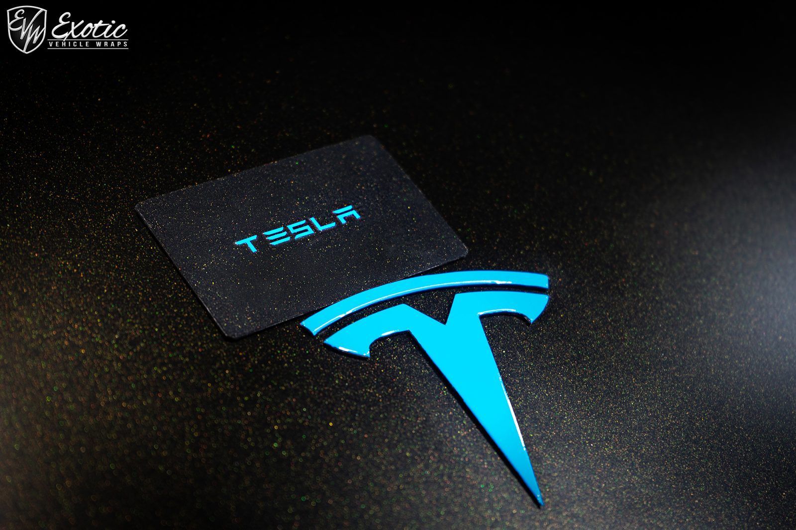 Turquoise Tesla logo and
