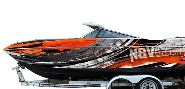 Boat with orange and black graphics on a trailer.