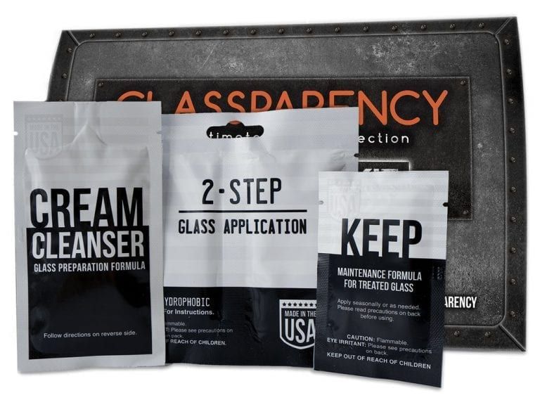 Glassparency car glass treatment kit with three pouches and metal box.