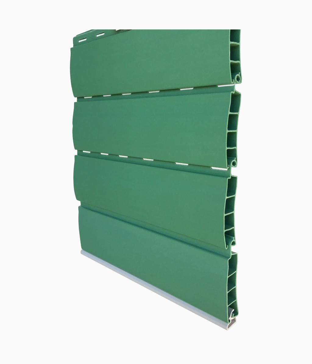 un otturatore di plastica verde su sfondo bianco