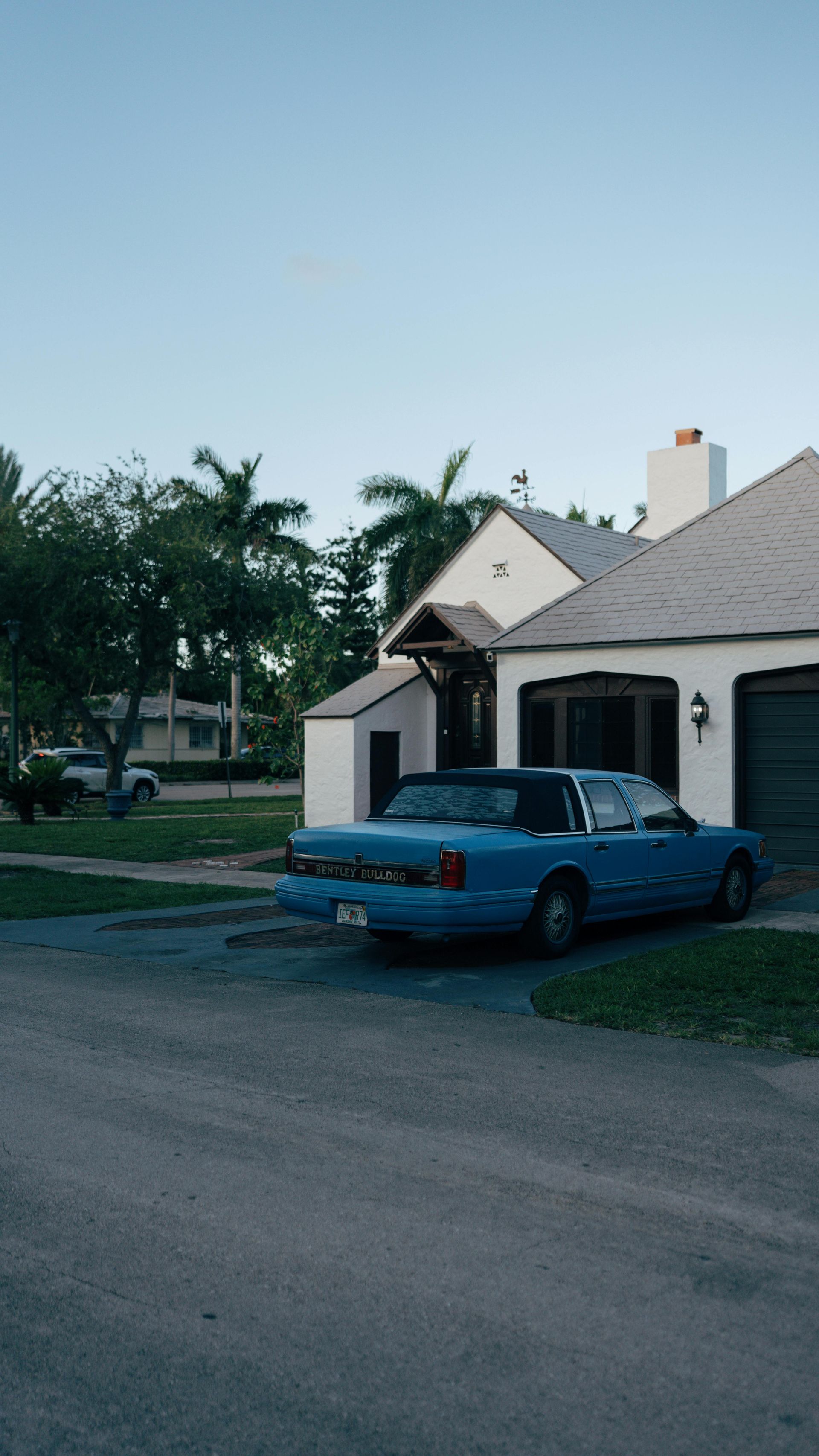 A man and a woman are standing next to each other and smiling.
